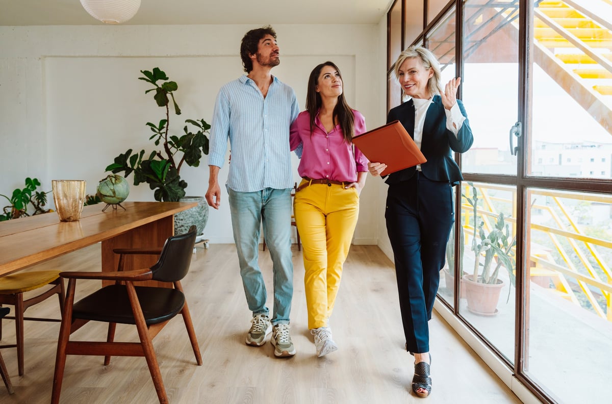 Woman and man buying property, real estate investment
